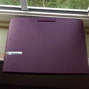Purple portable DVD player never used.